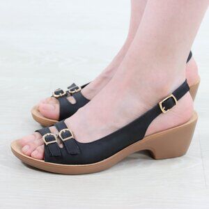 Elegant Black Sandals with Gold Accents